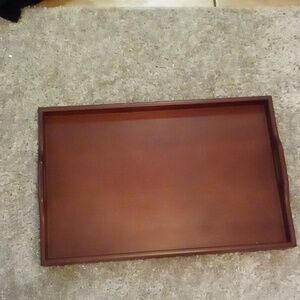 Wooden serving tray. Never used just decor. Handles on sides easier to carry.